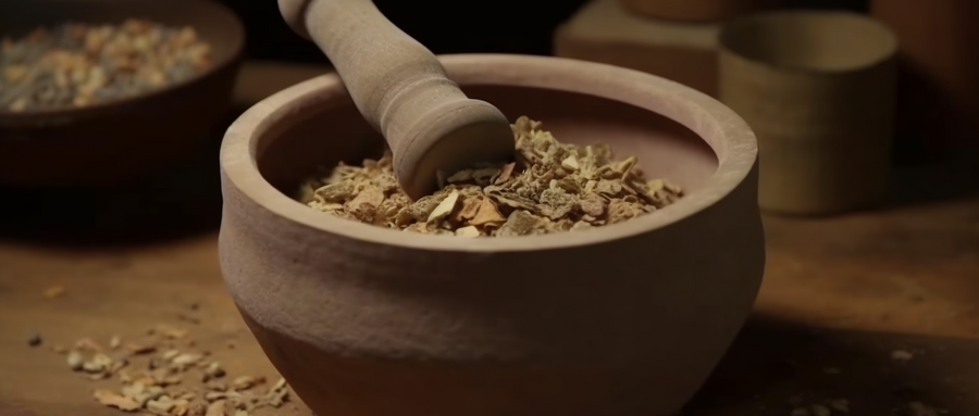 摄图网_600141252_研钵研杵将草药磨成粉末的过程(企业商用).jpg